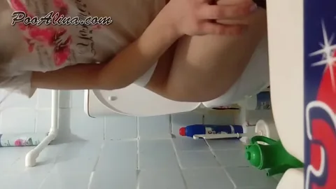 PooAlina - Young lady Alina shitting on toilet in the morning 11